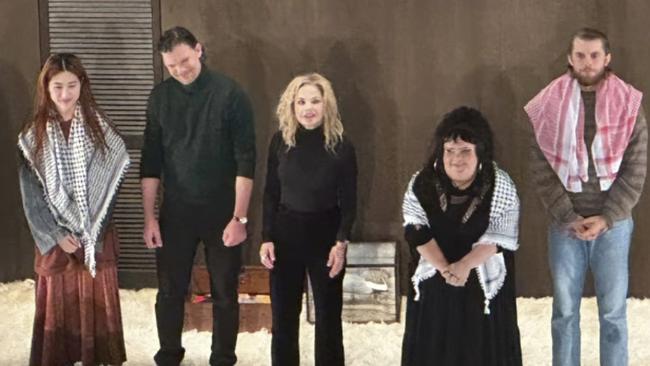 Harry Greenwood, right, along with co-stars Megan Wilding, second right, and Mabel Li, left, wore keffiyeh scarves during the encore at the opening night of the Sydney Theatre Company production of The Seagull. Picture: Instagram