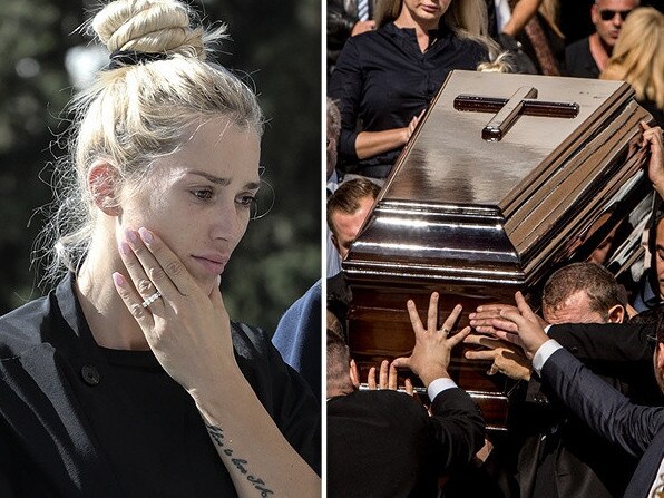 Viktoria Karyda, the wife of John Macris, watches her husband’s coffin leave the funeral ceremony last November. Pictures: Angelo Christofilopoulos