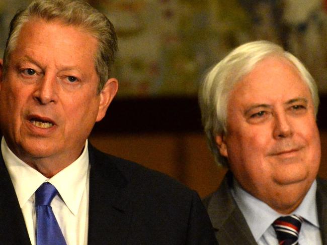 Palmer United Party leader Clive Palmer and former US Vice President Al Gore at Parliament House in Canberra,Wednesday, June 25, 2014. The PUP will vote in the Senate to abolish the carbon tax but will demand legislative changes in a bid to lock in falling power prices. (AAPImage/Alan Porritt) NO ARCHIVING