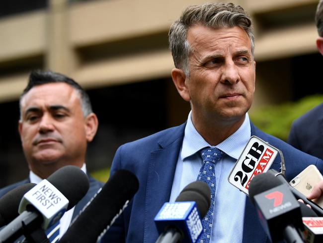 (L-R) NSW Deputy Premier and Minister responsible for Disaster Recovery John Barilaro, NSW Minister for Transport and Roads Andrew Constance and NSW Treasurer Dominic Perrottet speak to the media at New South Wales Parliament House in Sydney, Tuesday, March 3, 2020. (AAP Image/Joel Carrett) NO ARCHIVING