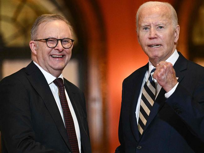 US President Joe Biden bids farewell to Australian Prime Minister Anthony Albanese at the end of the Quadrilateral Summit at the Archmere Academy in Wilmington, Delaware, on September 21, 2024. (Photo by Brendan SMIALOWSKI / AFP)