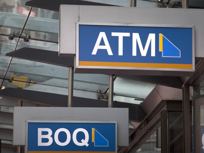 Bank of Queensland signage at the Brisbane head office , on Thursday, November 17, 2011. Bank of Queensland Managing Director and CEO - Stuart Grimshaw, said it was incumbent on the banks to reduce expenditure in line with revenue to retain profit margins, and wages made up the bulk of banking costs, adding that banking jobs could be on the line if the European sovereign debt crisis bites harder than initially expected.He said the European crisis was having a minor impact on the banking sector's bottom line so far, while the slowdown in home loan applications was having a bigger effect. Photographer : Patrick Hamilton/Bloomberg