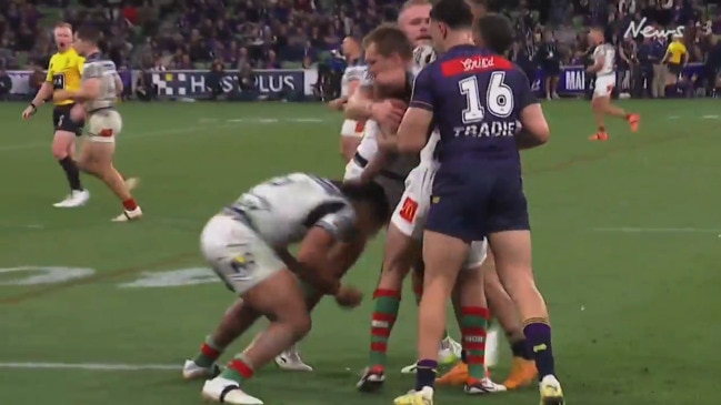 Rabbitoh Taane Milne lands a horror tackle on Storm star Cam Munster