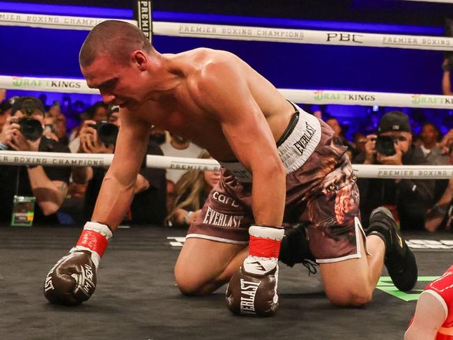 ORLANDO, FLORIDA - OCTOBER 19: Bakhram Murtazaliev walks to the corner after knocking down Tim Tszyu at Caribe Royale Orlando on October 19, 2024 in Orlando, Florida.   Alex Menendez/Getty Images/AFP (Photo by Alex Menendez / GETTY IMAGES NORTH AMERICA / Getty Images via AFP)