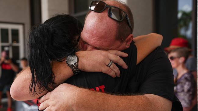 Declan Laverty’s father, Damian Crook, embraces rally organiser Cobie Campbell in an emotional moment. Picture: Pema Tamang Pakhrin