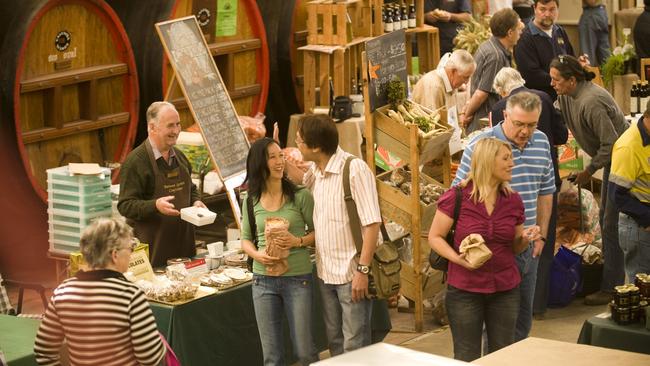 Customers shopping for fresh produce at the Barossa Farmers' Market.