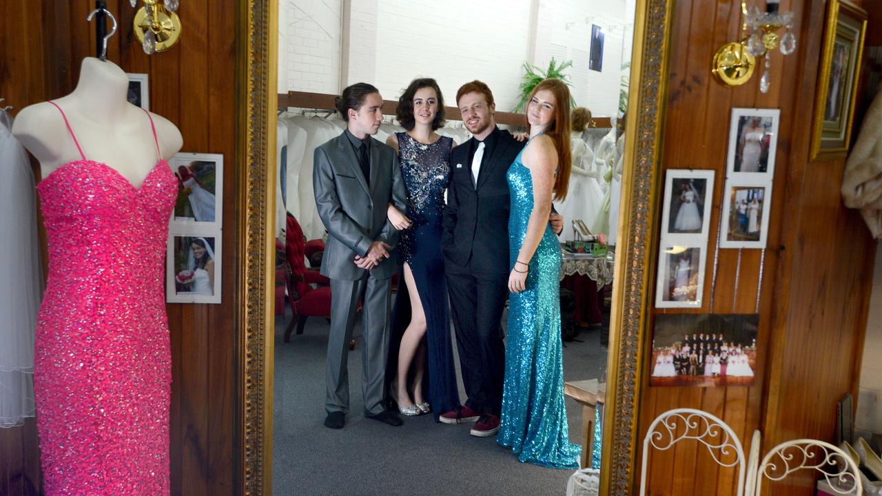 Richmond River High School students, from left Bodhi Towers, Teshan Joy, Ryley Adams and Shannon Richardson, trying on outfits at Mary Vidler Bridal in Lismore for their formal. Picture: Cathy Adams / The Northern Star