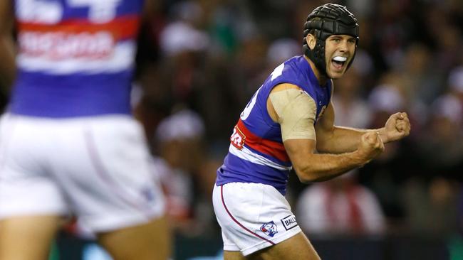 MELBOURNE, AUSTRALIA - APRIL 2: Caleb Daniel of the Bulldogs celebrates a goal during the 2016 AFL Round 02 match between the St Kilda Saints and the Western Bulldogs at Etihad Stadium, Melbourne on April 2, 2016. (Photo by Michael Willson/AFL Media/Getty Images)