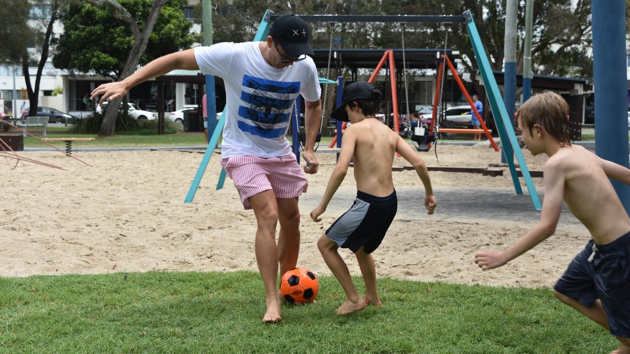 Benjamin Hampe with Levi and Archie Blattman in Cotton Tree Park, Maroochydore for Boxing Day. Picture: Sam Turner