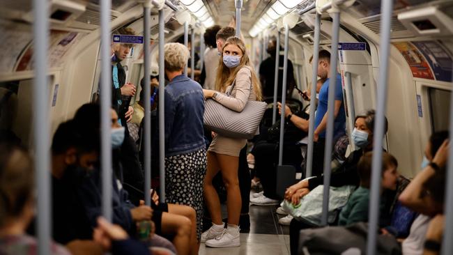 Around 70% of Britons still wear a mask in public places, such as on the London underground. Picture: AFP