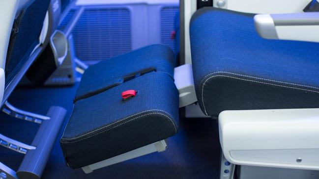 The footrest in the seats in British Airways World Traveller Plus.