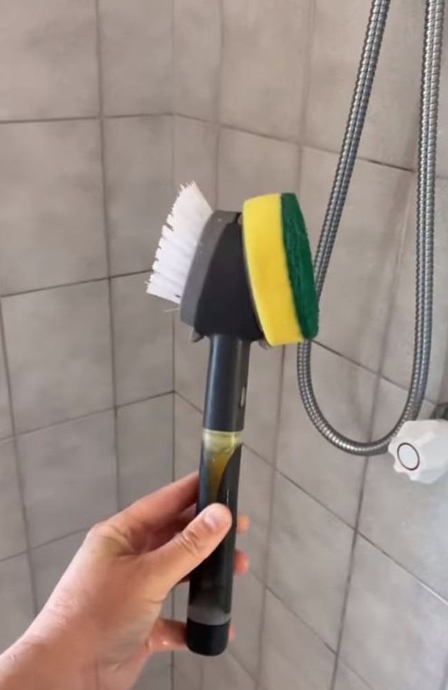A Genius Shower Cleaning Hack: A Dish Brush