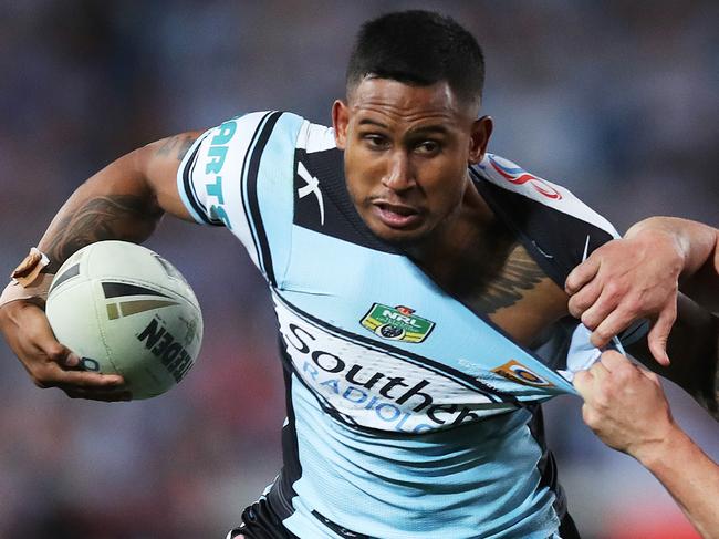 Shark's Ben Barba tackled by Storm's Blake Green during the NRL Grand Final between Cronulla Sharks v Melbourne Storm at ANZ Stadium. Picture. Phil Hillyard