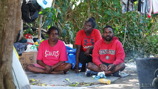 Martha, Elizabeth and Johnathan Day moved from Mapoon to Cairns nine months ago to escape conflict. They have been living in a camp in the bush, but the Cairns Regional Council has given them until Tuesday to move on. They say they have nowhere to go. Picture: Brendan Radke