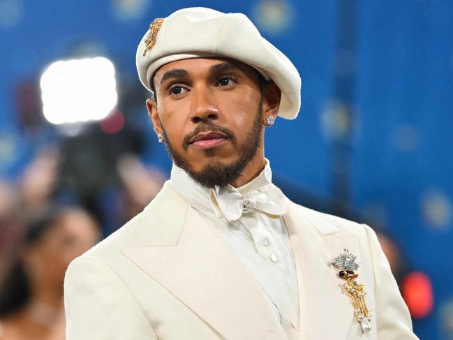 TOPSHOT - British race car driver Lewis Hamilton arrives for the 2025 Met Gala at the Metropolitan Museum of Art on May 5, 2025, in New York. The Gala raises money for the Metropolitan Museum of Art's Costume Institute. The 2025 Met Gala is themed 