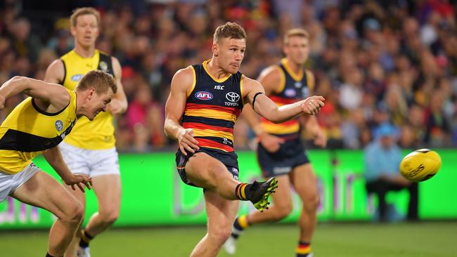 Rory Laird disposes of one of his 42 possessions in the grand final rematch against Richmond. Picture: Daniel Kalisz/Getty Images