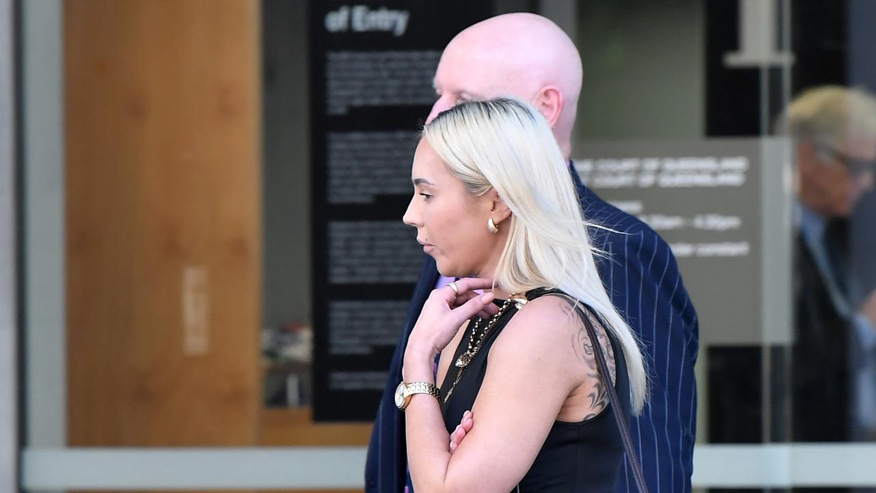 Lucan Jade Grace’s partner leaves Brisbane Supreme Court with barrister Tony Kimmins after Grace was sentenced for attempted murder. Picture: Patrick Woods.
