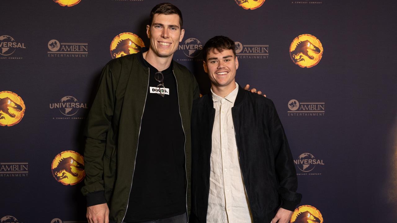 Josh Carmichael, pictured right with Collingwood teammate Mason Cox, will make his AFL debut on Saturday. Picture: Fiona Hamilton Photography