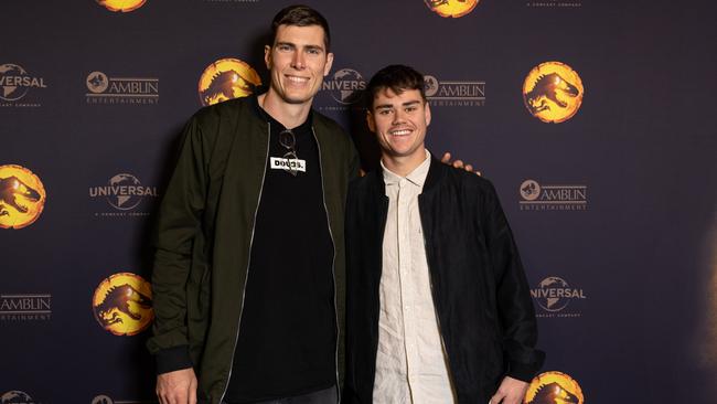 Josh Carmichael, pictured right with Collingwood teammate Mason Cox, will make his AFL debut on Saturday. Picture: Fiona Hamilton Photography