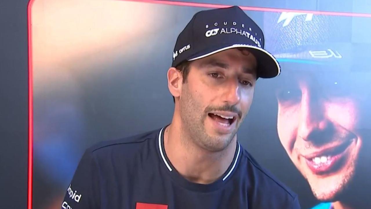 Daniel Ricciardo speaks to reporters.