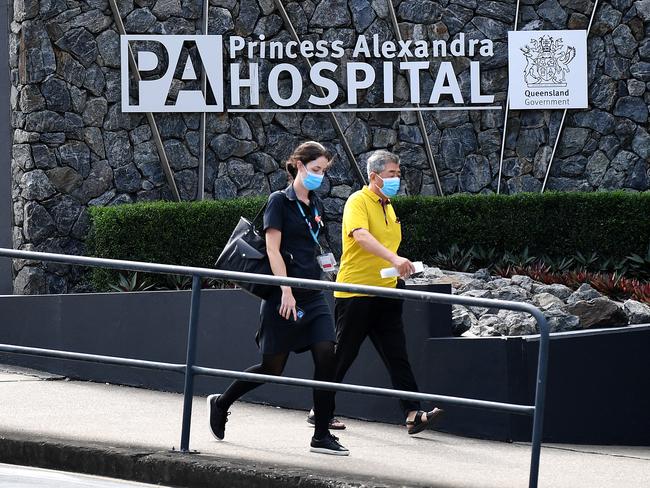 BRISBANE, AUSTRALIA - NewsWire Photos - MARCH 30, 2021.A nurse (left) is seen leaving the Princess Alexandra (PA) Hospital in Brisbane. A doctor and a nurse at the hospital are connected to a growing covid cluster which forced greater Brisbane into lockdown.Picture: NCA NewsWire / Dan Peled