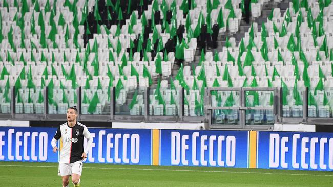 Juventus’ Portuguese forward Cristiano Ronaldo runs on the pitch in an empty stadium due to the coronavirus outbreak in Italy. Picture: Vincenzo Pinto/AFP.