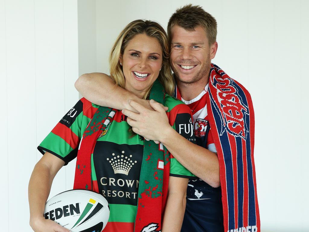 Candice and David Warner show off their colours. Picture: Brett Costello