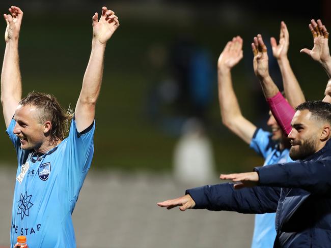 SYDNEY, AUSTRALIA - JULY 17: Ryhan Grant of Sydney FC and hi steam mates celebrates with the crowd after victory during the round 21 A-League match between Sydney FC and the Wellington Phoenix at Netstrata Jubilee Stadium on July 17, 2020 in Sydney, Australia. (Photo by Mark Kolbe/Getty Images)