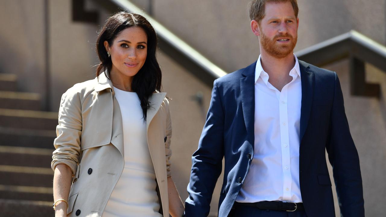 Prince Harry and Meghan pictured at the Sydney Opera House during their 2018 visit Down Under. Picture: Saeed Khan/AFP