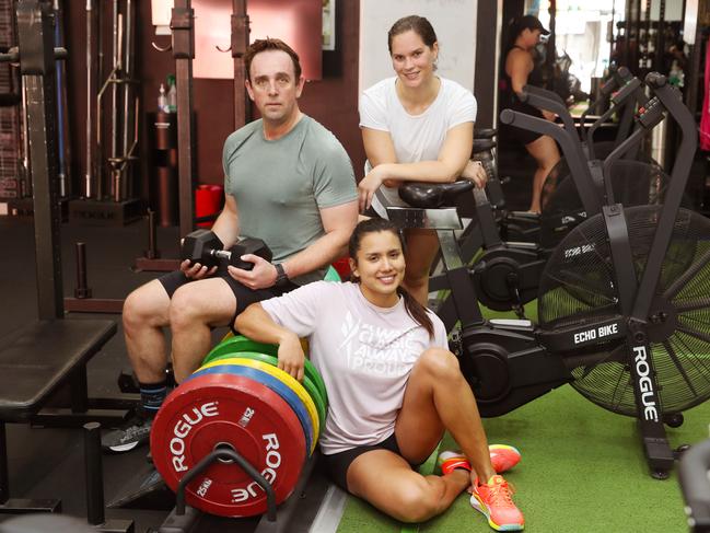 Nathalia Jaramilla (front), David Ryan and Jess Fitzpatrick are big believers in working out. Picture: David Crosling