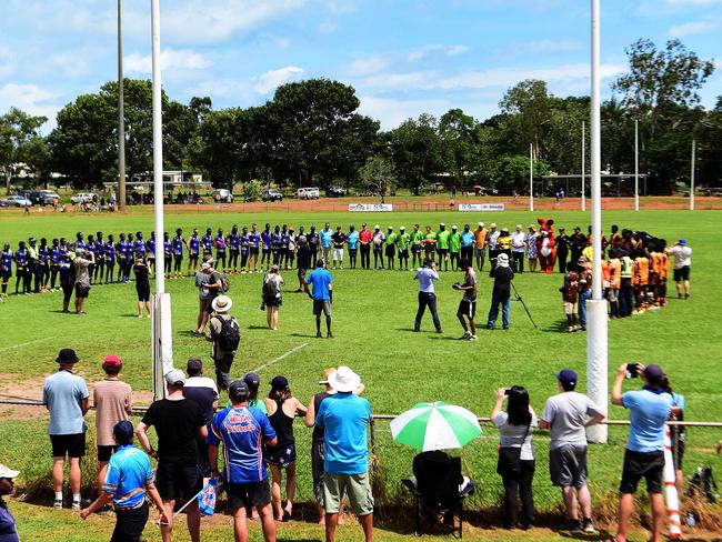 Ranku Eagles and Tapalinga Superstar join hands as part of the 'No More Campaign' on Sunday during this year's 49th Annual Tiwi Grand Final on Bathurst Island which is part of the Tiwi Islands chain, north of Darwin, NT.Picture: Justin Kennedy