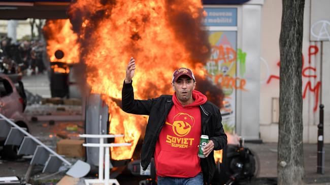 PARIS, FRANCE - MAY 01:  Vehicles are burning as thousands of people take to the streets during the May Day demonstrations on May 1, 2018 in Paris, France. This month celebrates the 50th anniversary of May 68 when France seen millions of students and striking workers, come onto the streets in demonstrations that changed the country.  (Photo by Jeff J Mitchell/Getty Images) *** BESTPIX ***