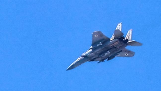 An Israeli air force fighter aircraft flies over Jabalia. Picture: AFP