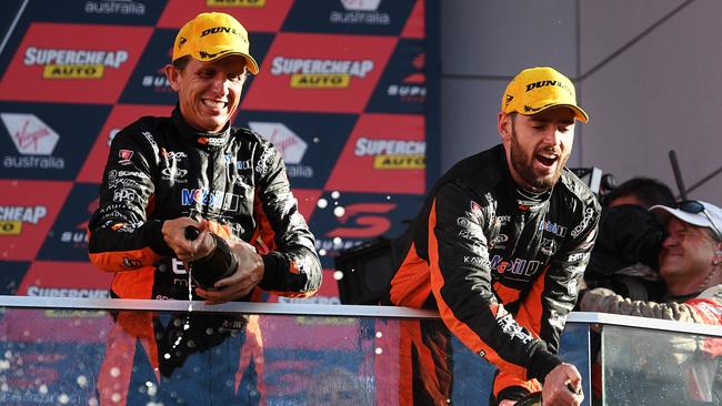 BATHURST, AUSTRALIA - OCTOBER 07:  2nd place Warren Luff driver of the #2 Mobil 1 Boost Mobile Racing Holden Commodore ZB and Scott Pye driver of the #2 Mobil 1 Boost Mobile Racing Holden Commodore ZB celebrate on the podiuM during the Bathurst 1000, which is race 25 of the Supercars Championship at Mount Panorama on October 7, 2018 in Bathurst, Australia.  (Photo by Daniel Kalisz/Getty Images)