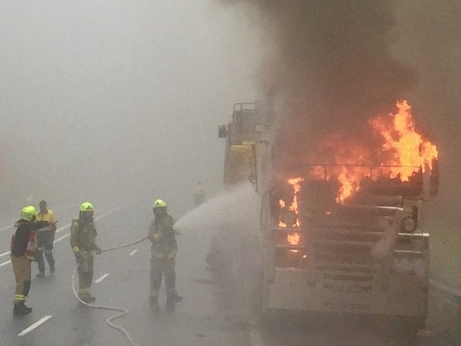 Fire and Rescue NSW crews extinguish a semi-trailer on fire at Clyde Mountain. Picture: Fire and Rescue NSW