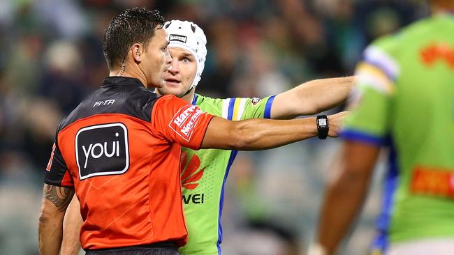 Raiders captain Jarrod Croker questions a decision with referee Henry Perenara during the Round 14 NRL match between Canberra and Penrith at GIO Stadium. Picture: Getty Images.