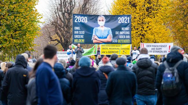 People take part in a protest of anti-vaccination activists in Vienna, Austria. Picture: AFP