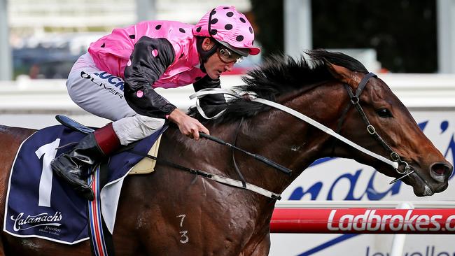 Damien Oliver won the Blue Sapphire Stakes on Flying Artie. Picture: Colleen Petch