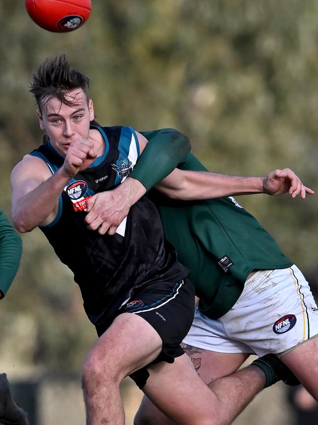 NFL: Laurimar’s Jake Valvo gets a handball away. Picture: Andy Brownbill