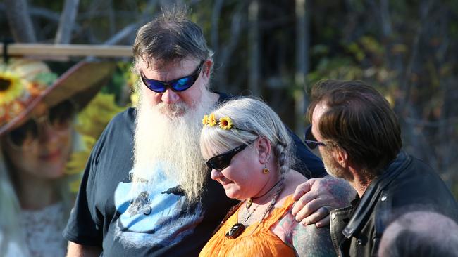 Friends and family members of Toyah Cordingley gather at her memorial at Wangetti Beach to commemorate the second anniversary of her death Snake Gardiner supports Toyah's mother Vanessa Gardiner and Wayne "Prong" Trimble as they speak to the crowd gathered at the memorial. PICTURE: BRENDAN RADKE