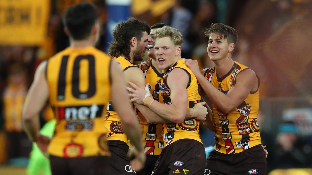 James Sicily leads Hawthorn’s celebrations after a win down in Tasmania last year.