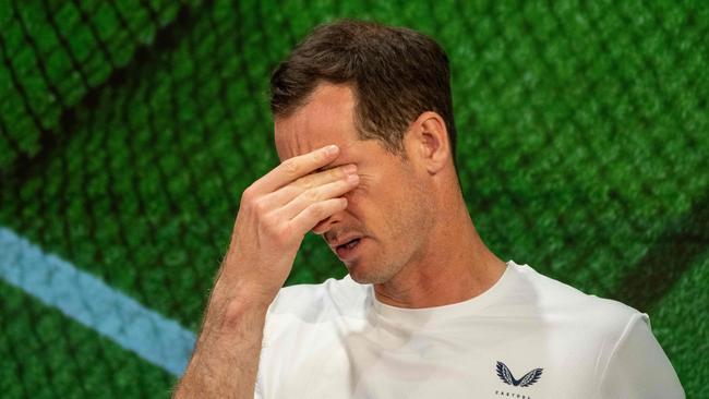 Andy Murray’s press conference after a doubles defeat at Wimbledon last year. (Photo by Joe TOTH/AFP)