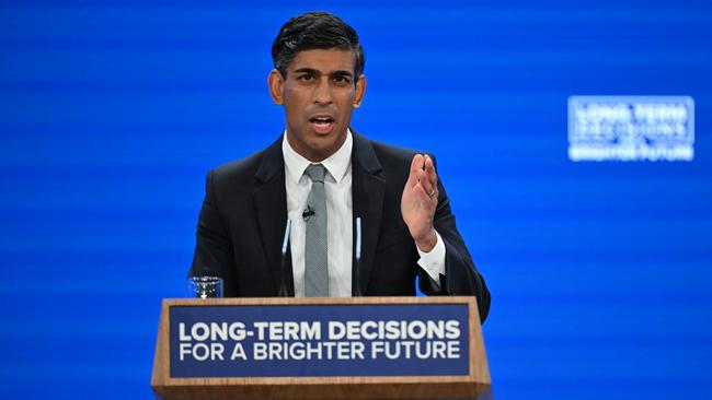 Britain's Prime Minister Rishi Sunak addresses delegates at the annual Conservative Party Conference in Manchester.