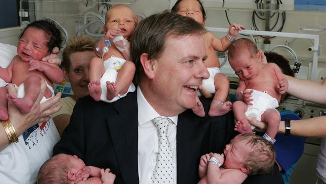 Then Treasurer Peter Costello with new born babies at Royal Women's Hospital in 2005.