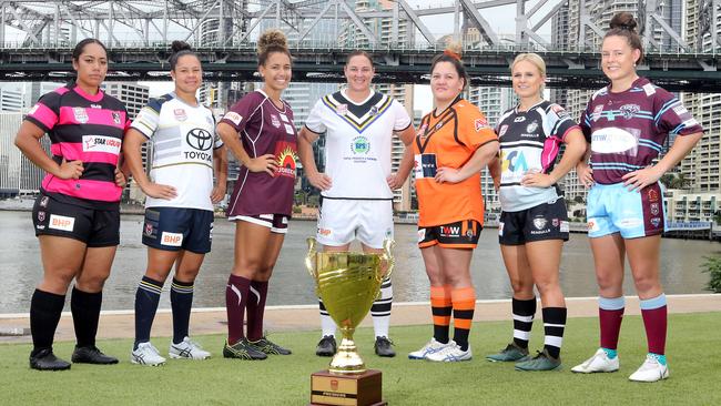 QRLW representatives Asi Mafi (West Brisbane), Jenni-Sue Hoepper (North Queensland), Teagan Laing (Burleigh), Steph Hancock (Souths Logan), Liahona Theodore (Easts), Brittany Faulkner (Tweed) and Mariah Storch (CQ). Picture: AAP Image/Richard Gosling