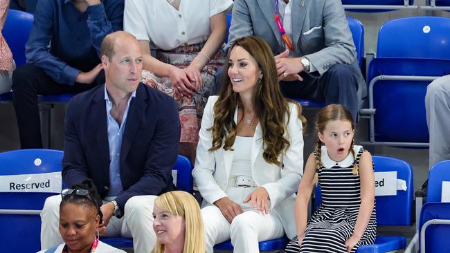 BIRMINGHAM, ENGLAND - AUGUST 02: Prince William, Duke of Cambridge, Catherine, Duchess of Cambridge and Princess Charlotte of Cambridge attend the Sandwell Aquatics Centre during the 2022 Commonwealth Games on August 02, 2022 in Birmingham, England. (Photo by Chris Jackson/Getty Images)