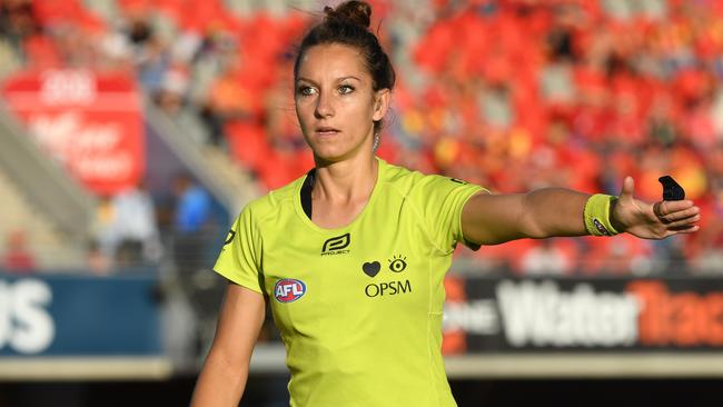 Could AFL umpires like Eleni Glouftsis be adjudicating the last-disposal out-of-bounds rule in the AFL one day? AFLW is set to introduce it for 2018. Picture: AAP