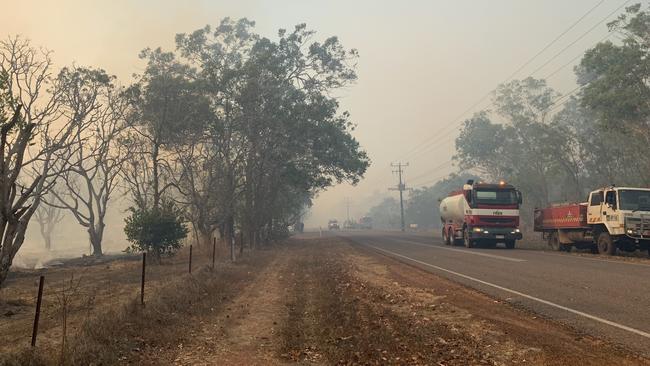 Firefighters were battling a bushfire spreading on multiple fronts near the Girraween Golf Course and Humpty Doo on Sunday afternoon. Picture: Katrina Bridgeford