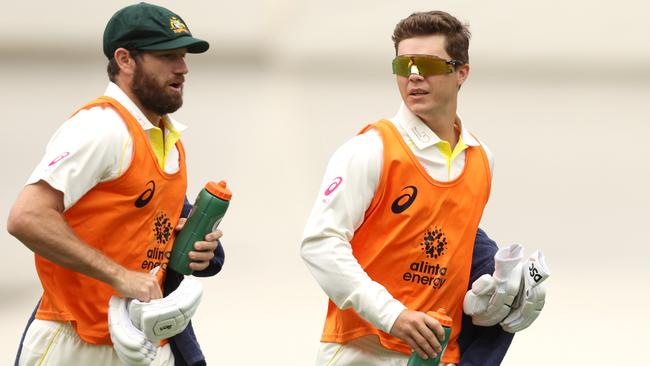 Michael Nesser and Mitchell Swepson running drinks during the fourth Test (Photo by Mark Kolbe/Getty Images)