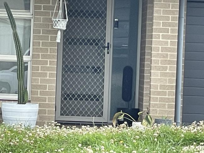 Drop zone: The rented house at 6 Sirocco Drive, Wadalba, where David Bui and his pregnant partner Tahley Partland lived. Police allege the couple used a black pot plant out the front as a "dead drop" location to supply large amounts of methamphetamine. Picture: NewsLocal